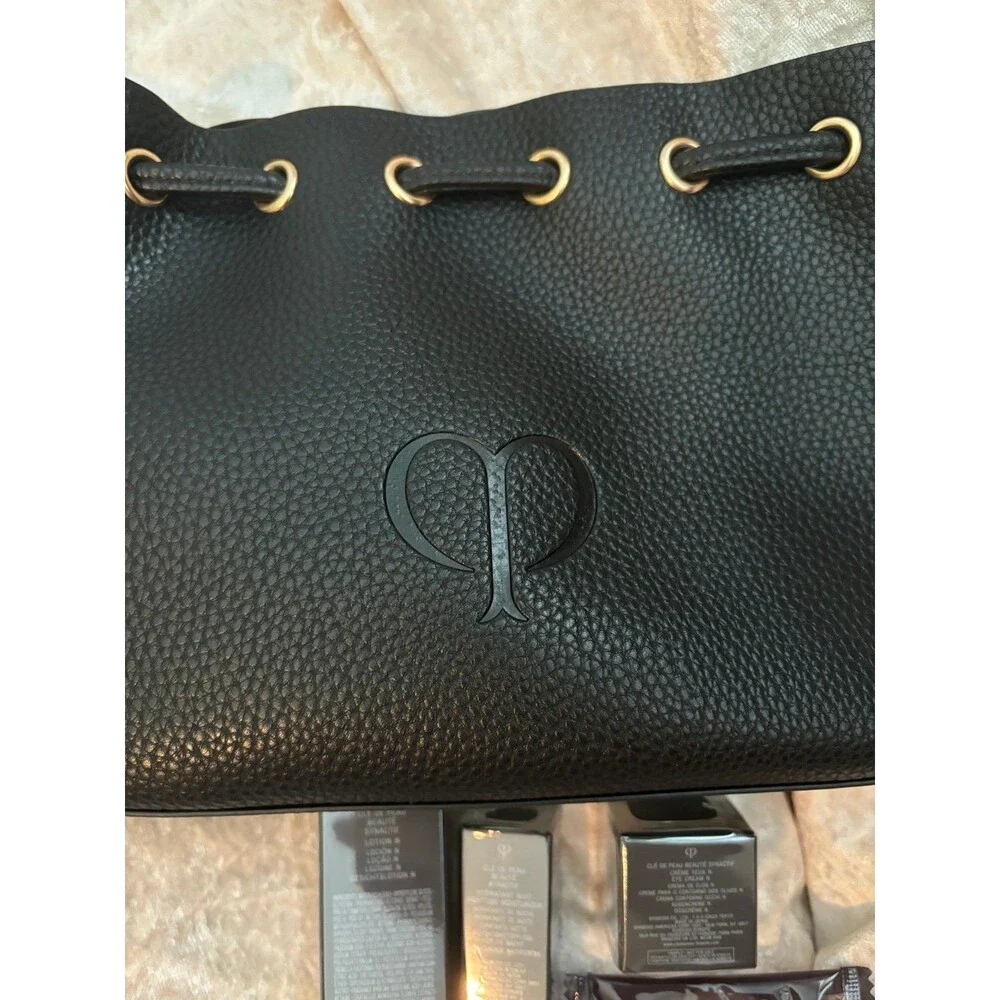 Cle de peau set of 4 plus bag